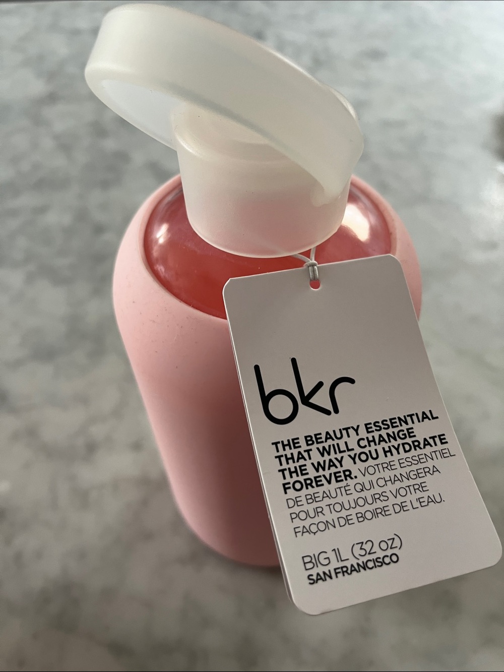 bkr Glass Water Bottle with Blush Pink Silicone Sleeve and White Flip Cap
